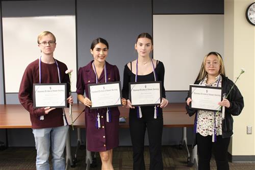 Five Gates Chili students holding up certificates after being inducted into the BOCES 2 CTE NTHS